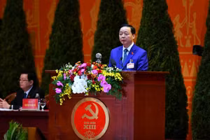 Bộ trưởng Tài nguyên và Môi trường Trần Hồng Hà trình bày tham luận. (ẢNH: ANH TUẤN - DUY LINH)