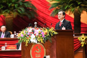 Đồng chí Lê Hồng Quang, Ủy viên Trung ương Đảng, Phó Chánh án Thường trực Tòa án nhân dân tối cao trình bày tham luận. Ảnh: tuấn anh - DUY LINH
