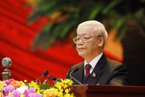 Đồng chí Nguyễn Phú Trọng, Tổng Bí thư Ban Chấp hành T.Ư Đảng, Chủ tịch nước CHXHCN Việt Nam đọc Báo cáo của Ban Chấp hành T.Ư Đảng khóa XII về các văn kiện trình Đại hội.