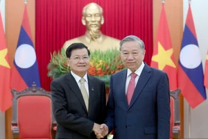Tổng Bí thư Tô Lâm và Tổng Bí thư, Chủ tịch nước Lào Thongloun Sisoulith. (Ảnh ĐĂNG KHOA)