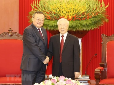 [Ảnh] Tổng Bí thư tiếp Trưởng Ban Liên lạc Đối ngoại Trung ương Đảng Cộng sản Trung Quốc