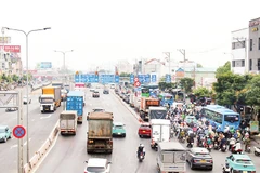 Quốc lộ 22 là trục giao thông huyết mạch nối Thành phố Hồ Chí Minh với Tây Ninh, được Thành phố Hồ Chí Minh đầu tư mở rộng theo phương thức đối tác công-tư với kinh phí đầu tư 10.400 tỷ đồng. (Ảnh VÕ LÊ)