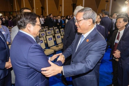 Thủ tướng Phạm Minh Chính và Thủ tướng Trung Quốc Lý Cường tại phiên khai mạc. (Ảnh: NHẬT BẮC/VGP)