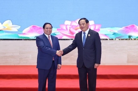 Thủ tướng Chính phủ Phạm Minh Chính và Thủ tướng Chính phủ Lào Sonexay Siphandone. (Ảnh: VGP/Nhật Bắc)