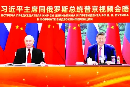 Hai nhà lãnh đạo Nga và Trung Quốc hội đàm trực tuyến. (Ảnh: TÂN HOA XÃ)