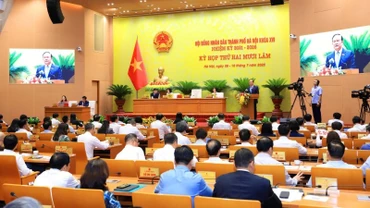 Quang cảnh phiên chất vấn trong khuôn khổ Kỳ họp thứ 25 của Hội đồng đồng nhân dân thành phố Hà Nội.