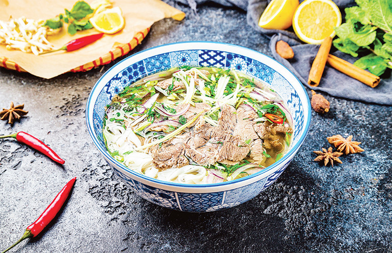 Phở được xếp vào danh sách "10 món ngon nên thưởng thức một lần trong đời" của Business Insider. Ảnh trong bài | Sun Group cung cấp