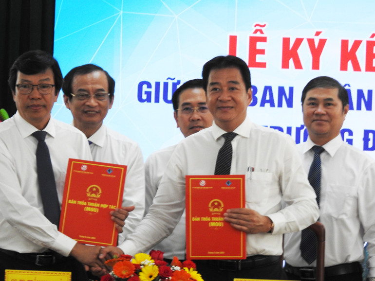 Hai bên đã hoàn thành việc ký kết thỏa thuận hợp tác. (Ảnh: NGUYỄN TRUNG)