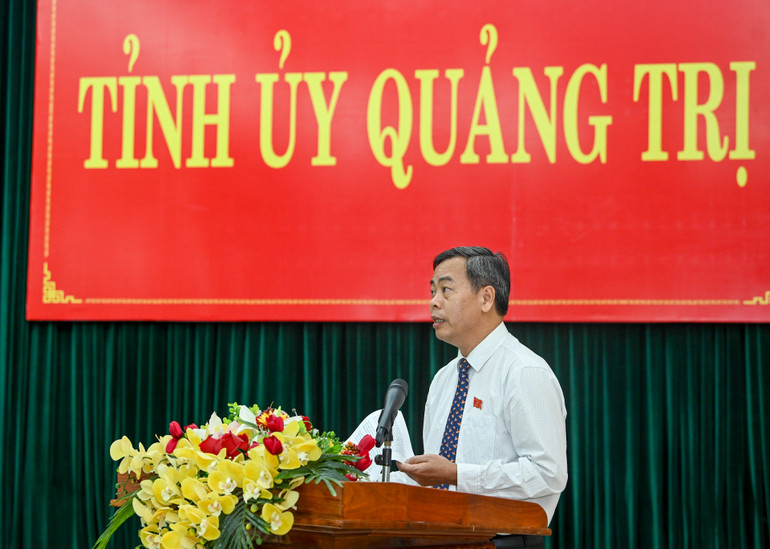 Phó Bí thư Thường trực Tỉnh ủy, Chủ tịch Hội đồng nhân dân tỉnh Nguyễn Đăng Quang trình bày báo cáo tại buổi làm việc. (Ảnh: DUY LINH)