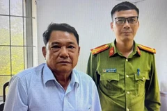 Đối tượng Thân Văn Giang tại cơ quan công an. (Ảnh: SỸ ĐỨC)