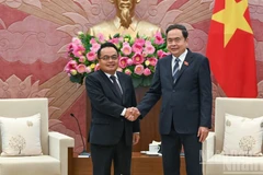 Chủ tịch Quốc hội Trần Thanh Mẫn và Chủ tịch Kiểm toán Lào Viengthavisone Thephachanh.