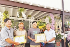 Anh Nguyễn Thanh Minh (thứ hai, trái sang). Ảnh: NVCC