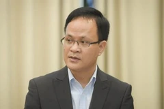 Vụ trưởng Vụ Chính sách tiền tệ (Ngân hàng Nhà nước) Phạm Chí Quang.