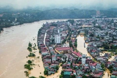 Phường Yên Bái, tỉnh Lào Cai, ngập sâu trong biển nước do ảnh hưởng của đợt mưa lũ vào cuối tháng 9 vừa qua. (Ảnh Thành Đạt)