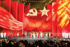 Liên khúc “Lá cờ Đảng-Việt Nam ơi mùa xuân đến rồi” mở màn chương trình nghệ thuật.