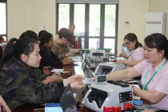 Giao dịch tại điểm giao dịch của Phòng Giao dịch Ngân hàng Chính sách xã hội Chợ Đồn.