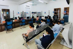 Quy trình giải quyết thủ tục hành chính được số hóa, bảo đảm công khai, minh bạch trong thu, nộp phí và lệ phí tại địa phương. (Ảnh: MINH PHƯƠNG)