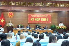 Quang cảnh phiên khai mạc kỳ họp Hội đồng nhân dân tỉnh Cà Mau vào sáng 8/12.