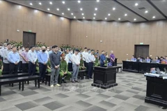 Các bị cáo tại phiên tòa sơ thẩm.