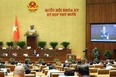 Quang cảnh phiên họp toàn thể ở hội trường chiều 8/12. (Ảnh: DUY LINH)