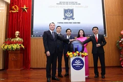 Nghi thức công bố Nghị quyết thành lập 3 trường thuộc Trường đại học Sư phạm Hà Nội. (Ảnh: THANH TÙNG)