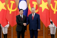 Tổng Bí thư Tô Lâm với Tổng Bí thư, Chủ tịch nước Lào Thongloun Sisoulith tại Trụ sở Trung ương Đảng. (Ảnh: ĐĂNG KHOA)