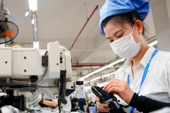 Công nhân làm việc tại Công ty Cổ phần Dệt may 29-3, thành phố Đà Nẵng