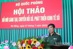 Thiếu tướng Đào Minh Đạo- Phó Cục trưởng Cục Tài chính, Bộ Quốc phòng phát biểu tại khai mạc hội thảo. (Ảnh: ĐÌNH TĂNG)