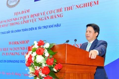 Phó Thống đốc Ngân hàng Nhà nước Phạm Tiến Dũng phát biểu tại tọa đàm.