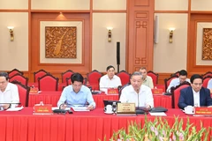 Tập thể Bộ Chính trị làm việc với ban thường vụ các Đảng ủy trực thuộc Trung ương. (Ảnh: ĐĂNG KHOA)