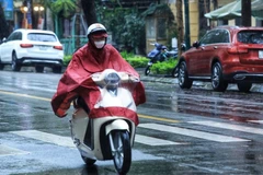 Dự báo khu vực Hà Nội có mưa vài nơi, sáng và đêm trời lạnh. (Ảnh minh họa: TTXVN)