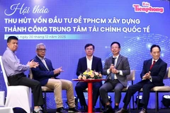 Các chuyên gia kinh tế tại hội thảo “Thu hút vốn đầu tư nước ngoài để Thành phố Hồ Chí Minh xây dựng thành công Trung tâm Tài chính quốc tế”, ngày 20/12.