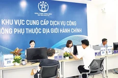 Thành phố Hà Nội đang tích cực chuyển đổi số mạnh mẽ trong thực hiện các thủ tục hành chính. Ảnh minh họa: nhandan.vn 