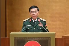 Đại tướng Phan Văn Giang, Ủy viên Bộ Chính trị, Bộ trưởng Quốc phòng trình bày báo cáo tiếp thu, giải trình, chỉnh lý dự thảo Luật. (Ảnh: Duy Linh)