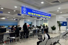 Giảm khoảng cách số, nâng cao khả năng tiếp cận dịch vụ công trực tuyến để không bỏ lại ai phía sau. (Ảnh: HNV)