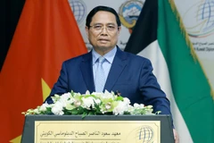 Thủ tướng Chính phủ Phạm Minh Chính phát biểu chính sách tại Học viện Ngoại giao Kuwait. (Ảnh: TTXVN)
