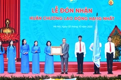 Tổng Bí thư Tô Lâm trao Huân chương Lao động hạng Nhất tặng Hội Liên hiệp Phụ nữ Việt Nam. 