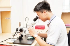 Con người là trung tâm của quá trình chuyển đổi xanh. Ảnh: Võ Liên