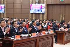 Các đồng chí lãnh đạo Thành ủy Hà Nội và các đại biểu dự hội nghị.