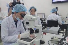 Hoạt động nghiên cứu khoa học tại Đại học Quốc gia Thành phố Hồ Chí Minh.