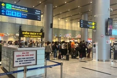 Đà Nẵng tăng cường giám sát, phòng, chống dịch bệnh do virus Nipah tại Cảng hàng không quốc tế Đà Nẵng. (Ảnh Trung tâm kiểm soát bệnh tật thành phố Đà Nẵng cung cấp)