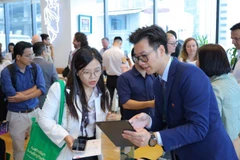 Các đại biểu trao đổi tại chương trình. (Ảnh: PV)