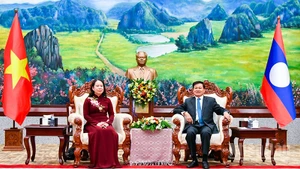 Tổng Bí thư, Chủ tịch nước Lào Thongloun Sisoulith và Phó Chủ tịch nước Võ Thị Ánh Xuân. (Ảnh: HẢI TIẾN)
