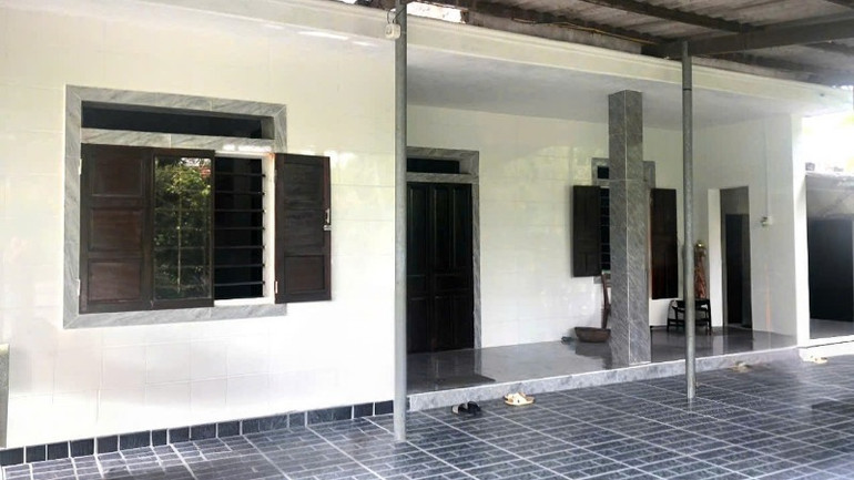 Một ngôi nhà vừa hoàn thành sửa chữa, bảo đảm nơi ăn ở khang trang, ổn định cho người dân.