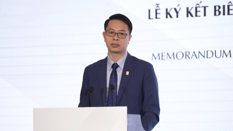 Chủ tịch Hội đồng Quản trị NAPAS Nguyễn Quang Hưng phát biểu tại lễ ký.