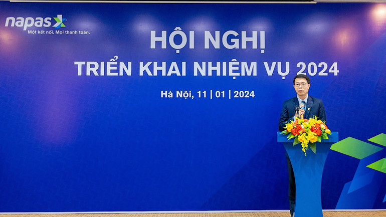 Ông Nguyễn Quang Hưng – Chủ tịch HĐQT NAPAS trình bày báo cáo kết quả hoạt động năm 2023.