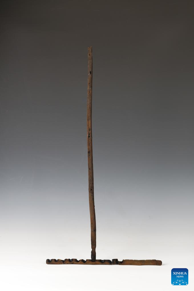 Ảnh bộ công cụ tạo lửa được khai quật tại di chỉ khảo cổ Caoyangang ở tỉnh Giang Tô, miền đông Trung Quốc. (Ảnh: Tân Hoa xã)