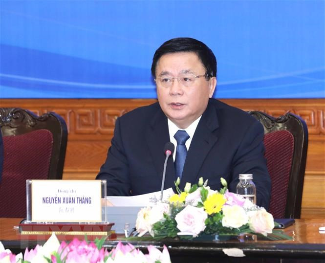 Ủy viên Bộ Chính trị, Chủ tịch Hội đồng Lý luận Trung ương, Giám đốc Học viện Chính trị Quốc gia Hồ Chí Minh Nguyễn Xuân Thắng phát biểu tại hội thảo. (Ảnh: TTXVN)