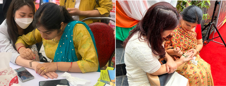 Du khách thích thú trải nghiệm vẽ henna Ấn Độ. Du khách thích thú trải nghiệm vẽ henna Ấn Độ.