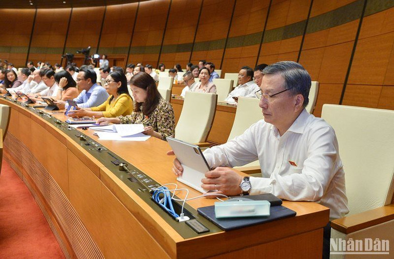 Các đại biểu tham dự phiên họp của Quốc hội sáng 7/6. (Ảnh: THỦY NGUYÊN)